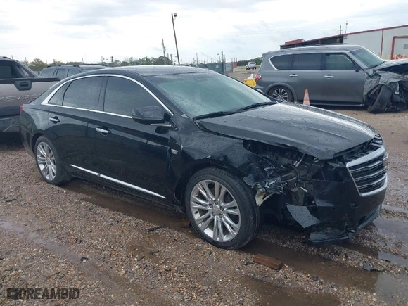 2019 Cadillac XTS Luxury with VIN 2G61M5S32K9141807, listed as a IAAI auction lot 41818444 with 84,864 mi miles. Bid and sale history available at carsss.com. Image 1.