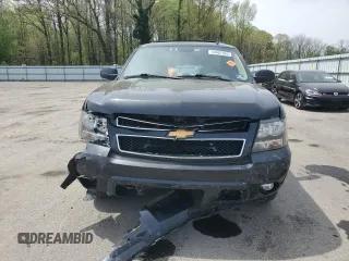 2012 Chevrolet Suburban LT with VIN 1GNSKJE77CR298049, listed as a Copart auction lot 61171865 with 247,737 mi miles and Salvage title. Bid and sale history available at DreamBid. Image 5.