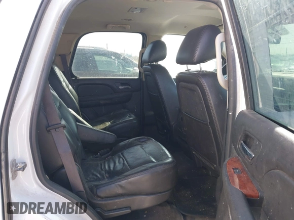 2011 GMC Yukon SLT with VIN 1GKS2CE03BR397395, listed as a IAAI auction lot 41813501 with 220,443 mi miles. Bid and sale history available at carsss.com. Image 8.