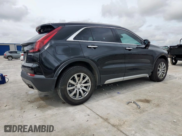 2020 Cadillac XT4 FWD Premium Luxury with VIN 1GYFZCR40LF073517, listed as a Copart auction lot 60121635 with 79,450 mi miles and Salvage title. Bid and sale history available at DreamBid. Image 3.