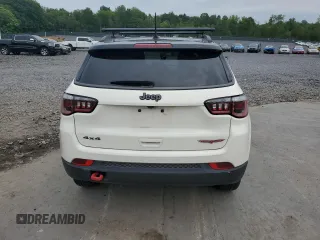 2019 Jeep Compass Trailhawk with VIN 3C4NJDDB5KT671613, listed as a Copart auction lot 61023125 with 64,793 mi miles and Salvage title. Bid and sale history available at DreamBid. Image 6.