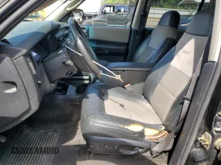 2001 Dodge Durango with VIN 1B4HS28Z91F580906, listed as a Copart auction lot 62870635 with 192,231 mi miles and Salvage title. Bid and sale history available at DreamBid. Image 7.
