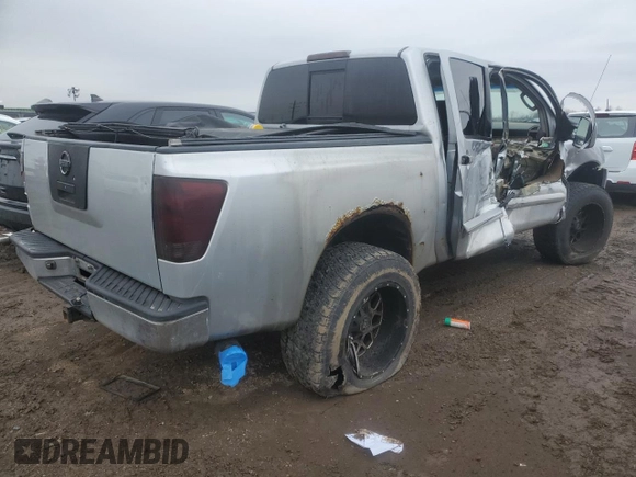 2004 Nissan Titan LE with VIN 1N6AA07A94N507274, listed as a Copart auction lot 47797205 with 144,021 mi miles and Salvage Title. Bid and sale history available at DreamBid. Image 3.