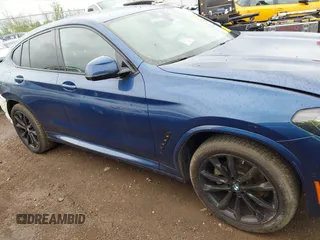 2023 BMW X4 xDrive30i z VIN 5UX33DT01P9P86340, wystawiony jako IAAI lot #42113558 z przebiegiem 27 226 mil mil oraz . Historia ofert i sprzedaży dostępna na DreamBid. Obrazek 14.