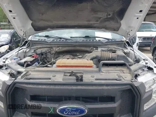 2015 Ford F-150 XL with VIN 1FTMF1E84FKD12758, listed as a IAAI auction lot 41841584 with 59,950 mi miles and . Bid and sale history available at DreamBid. Image 10.