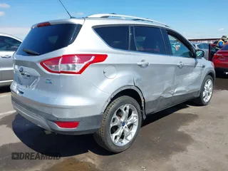 2013 Ford Escape Titanium z VIN 1FMCU0J94DUD84163, wystawiony jako IAAI lot #42406932 z przebiegiem 111 258 mil mil oraz . Historia ofert i sprzedaży dostępna na DreamBid. Obrazek 4.