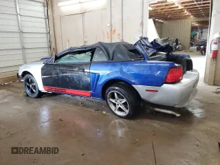 2004 Ford Mustang Deluxe with VIN 1FAFP44684F189081, listed as a Copart auction lot 59474985 with 249,812 mi miles and Salvage title. Bid and sale history available at DreamBid. Image 2.