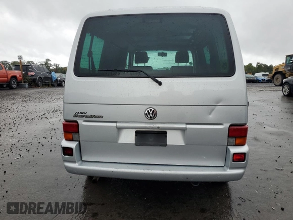 2003 Volkswagen EuroVan с VIN WV2KB47093H041606, выставлен на аукционе Copart как лот 73808224 с пробегом 228 496 миль миль и Чистый • Clean title. История ставок и продаж доступна на DreamBid. Изображение 6.
