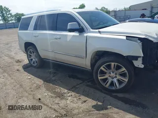 2015 Cadillac Escalade Premium with VIN 1GYS4NKJ7FR500218, listed as a IAAI auction lot 42246718 with 129,811 mi miles and . Bid and sale history available at DreamBid. Image 1.