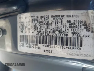 1997 Toyota Camry LE z VIN 4T1BG22K1VU101106, wystawiony jako IAAI lot #42065420 z przebiegiem 121 457 mil mil oraz . Historia ofert i sprzedaży dostępna na DreamBid. Obrazek 9.