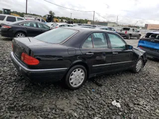 1999 Mercedes-Benz E-Class with VIN WDBJF65H4XA883351, listed as a Copart auction lot 73682964 with 156,446 mi miles and Salvage Title. Bid and sale history available at carsss.com. Image 3.