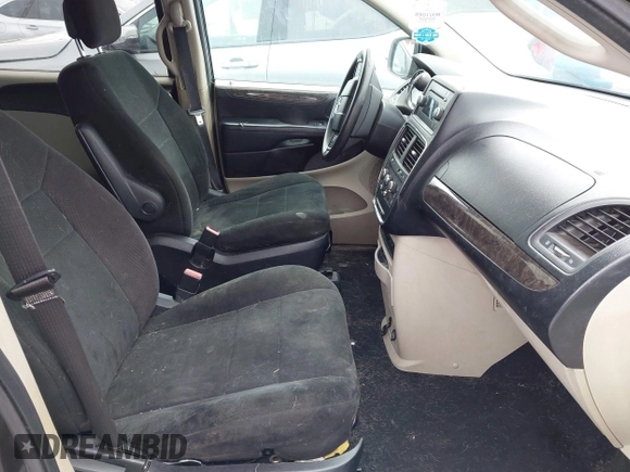 2011 Dodge Grand Caravan SXT with VIN 2D4RN4DG1BR768895, listed as a IAAI auction lot 42000143 with 42,976 mi miles and . Bid and sale history available at DreamBid. Image 5.
