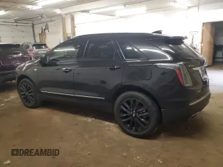 2021 Cadillac XT5 AWD Sport with VIN 1GYKNHRS1MZ103033, listed as a Copart auction lot 58586425 with 65,229 mi miles and Salvage title. Bid and sale history available at DreamBid. Image 2.