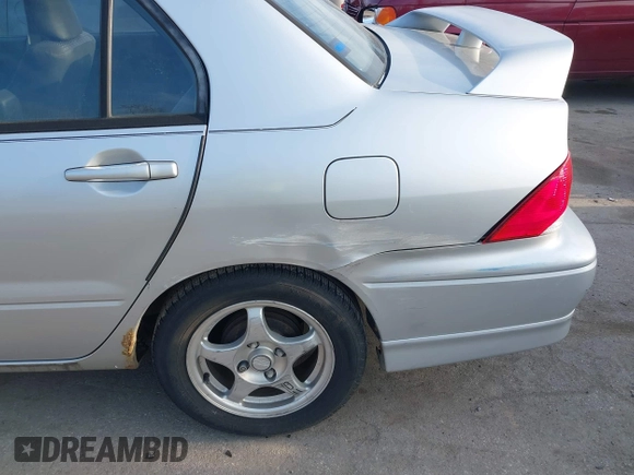 2003 Mitsubishi Lancer OZ-Rally with VIN JA3AJ86E63U022390, listed as a IAAI auction lot 41542407 with 184,639 mi miles. Bid and sale history available at carsss.com. Image 17.