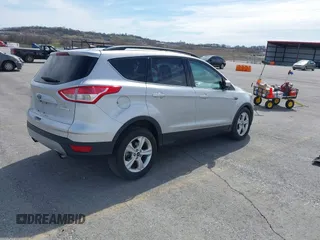 2016 Ford Escape SE with VIN 1FMCU0GX5GUA65025, listed as a IAAI auction lot 41858613 with 75,255 mi miles. Bid and sale history available at carsss.com. Image 4.