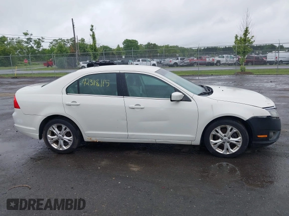2012 Ford Fusion SE z VIN 3FAHP0HA4CR261668, wystawiony jako IAAI lot #42318115 z przebiegiem 81 923 mil mil oraz . Historia ofert i sprzedaży dostępna na DreamBid. Obrazek 13.