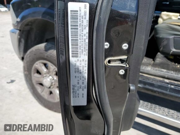 2018 Ram 2500 Big Horn z VIN 3C6UR5ML9JG139461, wystawiony jako Copart lot #71762814 z przebiegiem 203 063 mil mil oraz Czysty tytuł • Clean title. Historia ofert i sprzedaży dostępna na DreamBid. Obrazek 12.