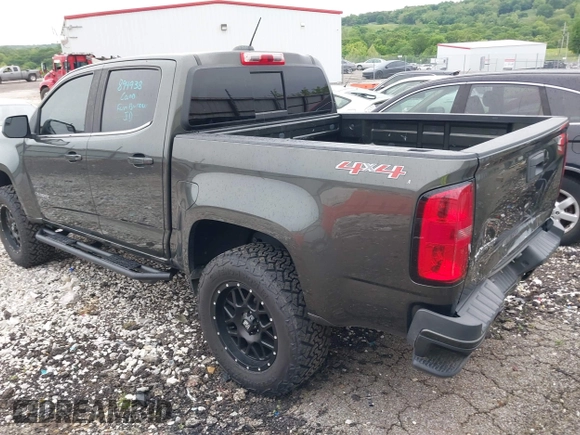 2018 Chevrolet Colorado 4WD LT z VIN 1GCGTCEN2J1235085, wystawiony jako IAAI lot #42192629 z przebiegiem 83 914 mil mil oraz . Historia ofert i sprzedaży dostępna na DreamBid. Obrazek 3.