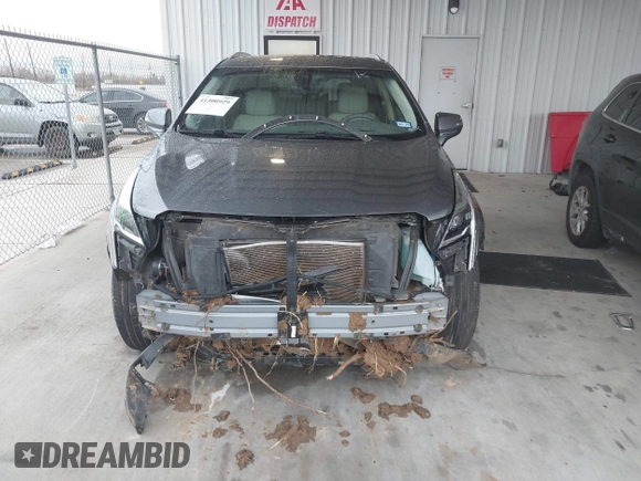 2020 Cadillac XT5 Premium Luxury FWD with VIN 1GYKNCRS4LZ152261, listed as a IAAI auction lot 41300929 with 53,709 mi miles. Bid and sale history available at carsss.com. Image 12.