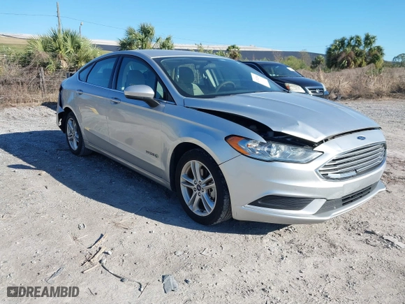2018 Ford Fusion Hybrid S with VIN 3FA6P0UU8JR244912, listed as a IAAI auction lot 41742940 with 65,885 mi miles. Bid and sale history available at carsss.com. Image 1.