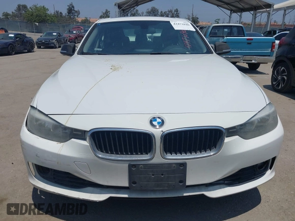 2014 BMW 3 Series 328i with VIN WBA3C1C59EK111396, listed as a IAAI auction lot 42471040 with 182,636 mi miles and . Bid and sale history available at DreamBid. Image 12.