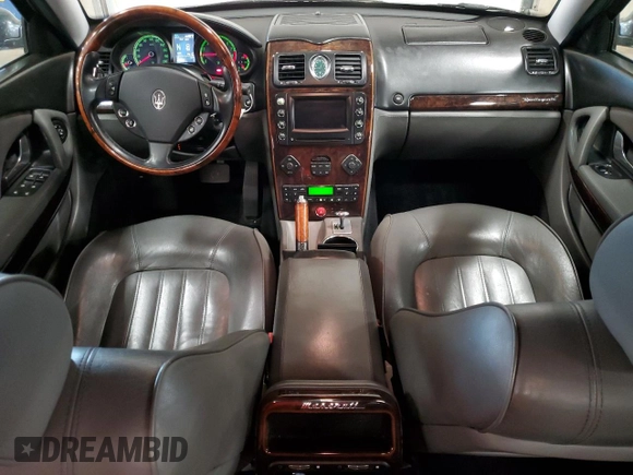 2005 Maserati Quattroporte z VIN ZAMCE39A350017390, wystawiony jako Copart lot #72455664 z przebiegiem 50 394 mil mil oraz Szkoda całkowita • Salvage title. Historia ofert i sprzedaży dostępna na DreamBid. Obrazek 8.