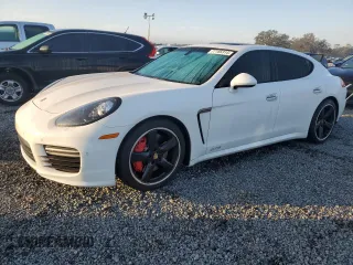 2015 Porsche Panamera GTS with VIN WP0AF2A71FL080796, listed as a Copart auction lot 77185314 with 74,765 mi miles and Salvage Title. Bid and sale history available at DreamBid. Image 1.