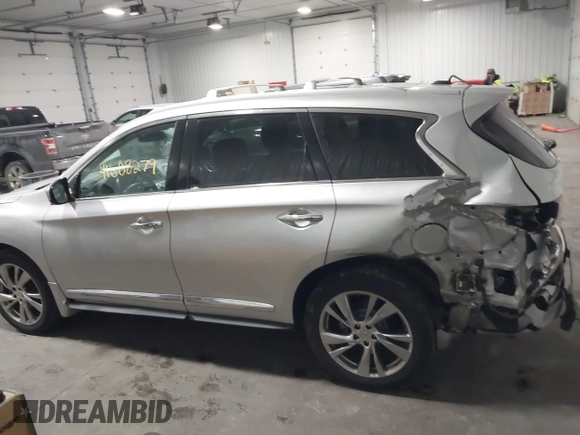 2013 Infiniti JX35 with VIN 5N1AL0MMXDC344217, listed as a IAAI auction lot 41608279 with 106,015 mi miles and . Bid and sale history available at DreamBid. Image 14.