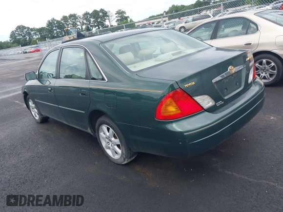 2000 Toyota Avalon XL z VIN 4T1BF28B6YU036865, wystawiony jako IAAI lot #42402305 z przebiegiem 202 265 mil mil oraz . Historia ofert i sprzedaży dostępna na DreamBid. Obrazek 3.