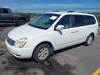 2012 Kia Sedona LX with VIN KNDMG4C71C6447550, listed as a IAAI auction lot 42190357 with 161,960 mi miles and . Bid and sale history available at carsss.com. Image 2.