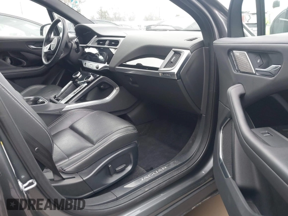 2020 Jaguar I-Pace SE with VIN SADHC2S13L1F79454, listed as a IAAI auction lot 41728860 with 32,035 mi miles and . Bid and sale history available at DreamBid. Image 5.