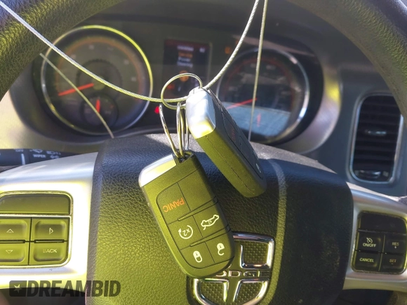 2012 Dodge Charger SE with VIN 2C3CDXBG1CH211300, listed as a IAAI auction lot 42049480 with 156,303 mi miles and . Bid and sale history available at DreamBid. Image 11.