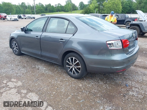 2013 Volkswagen Jetta S z VIN 3VW2K7AJ5DM369293, wystawiony jako IAAI lot #42172959 z przebiegiem 170 983 mil mil oraz . Historia ofert i sprzedaży dostępna na DreamBid. Obrazek 3.