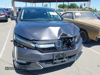 2018 Honda Clarity Touring z VIN JHMZC5F33JC021811, wystawiony jako IAAI lot #42272808 z przebiegiem 82 414 mil mil oraz . Historia ofert i sprzedaży dostępna na DreamBid. Obrazek 12.