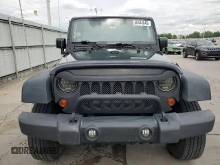 2013 Jeep Wrangler Unlimited Sport with VIN 1C4BJWDG0DL560265, listed as a Copart auction lot 58444045 with 111,354 mi miles and Salvage title. Bid and sale history available at DreamBid. Image 5.