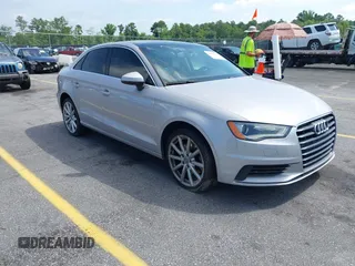 2015 Audi A3 Premium Plus z VIN WAUCCGFF6F1061507, wystawiony jako IAAI lot #42502310 z przebiegiem 131 670 mil mil oraz . Historia ofert i sprzedaży dostępna na DreamBid. Obrazek 1.