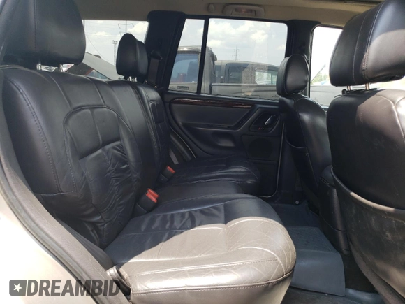2001 Jeep Grand Cherokee Limited with VIN 1J4GW58S91C586210, listed as a Copart auction lot 58985344 with 151,912 mi miles and Salvage Title. Bid and sale history available at carsss.com. Image 11.