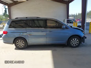 2010 Honda Odyssey EX-L with VIN 5FNRL3H61AB046416, listed as a IAAI auction lot 42157812 with 129,525 mi miles and . Bid and sale history available at DreamBid. Image 14.