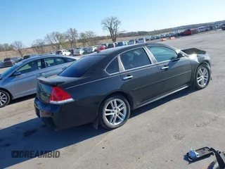 2013 Chevrolet Impala LTZ with VIN 2G1WC5E3XD1237776, listed as a IAAI auction lot 42023033 with 143,279 mi miles and . Bid and sale history available at DreamBid. Image 4.