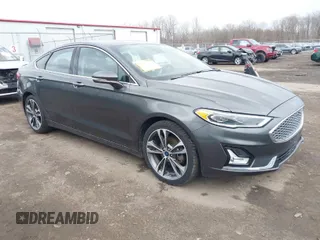 2019 Ford Fusion Titanium with VIN 3FA6P0K9XKR259556, listed as a IAAI auction lot 41823997 with 132,071 mi miles. Bid and sale history available at carsss.com. Image 1.