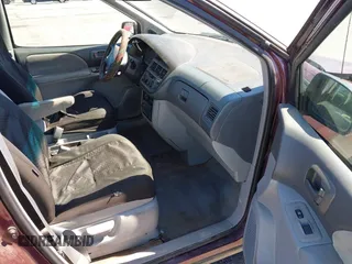 1999 Toyota Sienna LE with VIN 4T3ZF13C1XU112717, listed as a IAAI auction lot 41725827 with 272,639 mi miles. Bid and sale history available at carsss.com. Image 5.