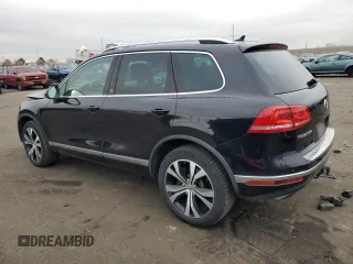 2017 Volkswagen Touareg Wolfsburg Edition with VIN WVGRF7BP9HD006520, listed as a Copart auction lot 84168634 with 76,596 mi miles and Salvage title. Bid and sale history available at DreamBid. Image 2.