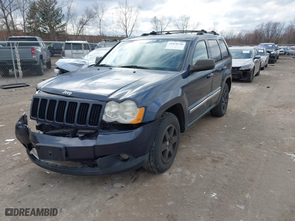 2010 Jeep Grand Cherokee Laredo with VIN 1J4PR4GK5AC138498, listed as a IAAI auction lot 41870740 with 130,551 mi miles. Bid and sale history available at carsss.com. Image 17.