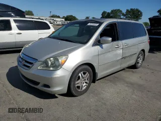 2005 Honda Odyssey EX-L z VIN 5FNRL386X5B407129, wystawiony jako Copart lot #56366655 z przebiegiem 181 893 mil mil oraz Szkoda całkowita • Salvage title. Historia ofert i sprzedaży dostępna na DreamBid. Obrazek 1.