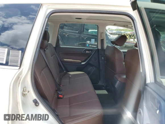 2017 Subaru Forester Touring with VIN JF2SJGWC2HH594766, listed as a Copart auction lot 50199083 with 51,189 mi miles and . Bid and sale history available at DreamBid. Image 11.