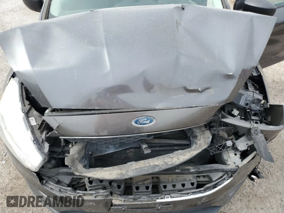 2017 Ford Focus S z VIN 1FADP3E21HL304026, wystawiony jako Copart lot #58786875 z przebiegiem 68 092 mil mil oraz Szkoda całkowita • Salvage title. Historia ofert i sprzedaży dostępna na DreamBid. Obrazek 11.