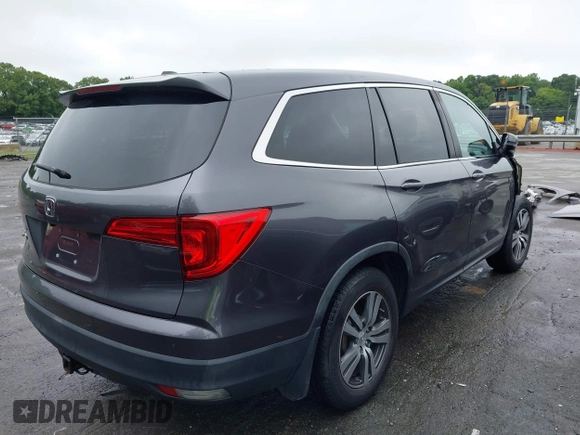 2017 Honda Pilot EX-L z VIN 5FNYF5H77HB033090, wystawiony jako IAAI lot #42359412 z przebiegiem 131 032 mil mil oraz . Historia ofert i sprzedaży dostępna na DreamBid. Obrazek 4.