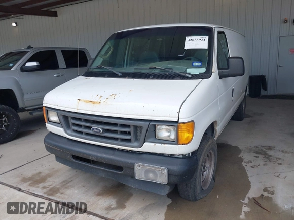 2006 Ford Econoline Cargo with VIN 1FTNE24W06HB02149, listed as a IAAI auction lot 42055924 with 229,432 mi miles and . Bid and sale history available at DreamBid. Image 6.