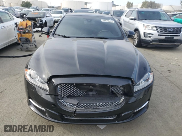 2015 Jaguar XJ with VIN SAJWA2GZ4F8V86379, listed as a Copart auction lot 42624615 with 55,803 mi miles and Salvage Title. Bid and sale history available at carsss.com. Image 5.