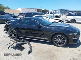 2021 Ford Mustang EcoBoost with VIN 1FA6P8TH1M5137372, listed as a IAAI auction lot 42031716 with 58,475 mi miles and . Bid and sale history available at DreamBid. Image 14.